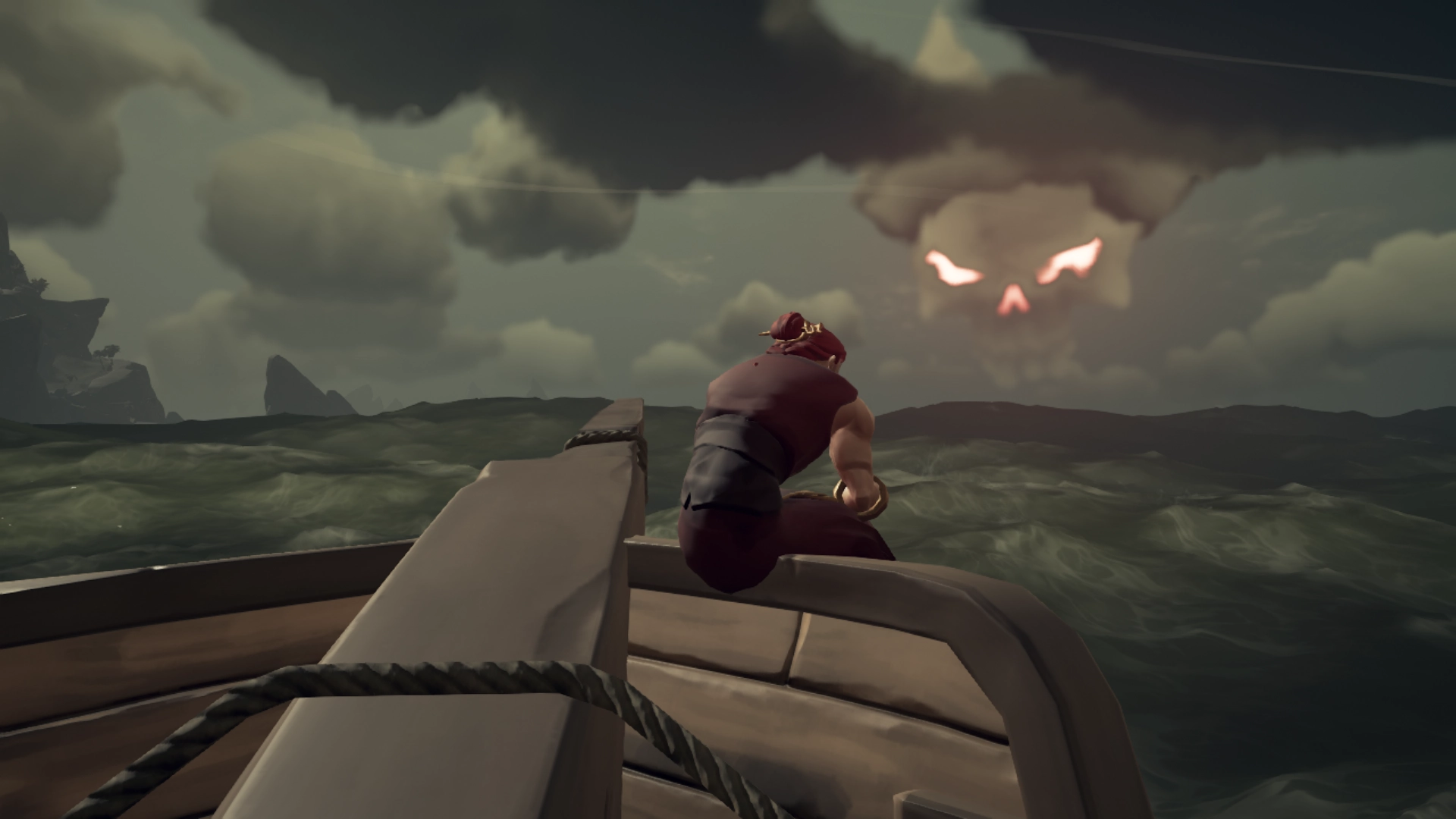 Un pirata su una barca nel videogioco Sea of Thieves osserva una nuvola a forma di teschio, metafora dell'immagine contemporanea discussa da Denis Brotto.